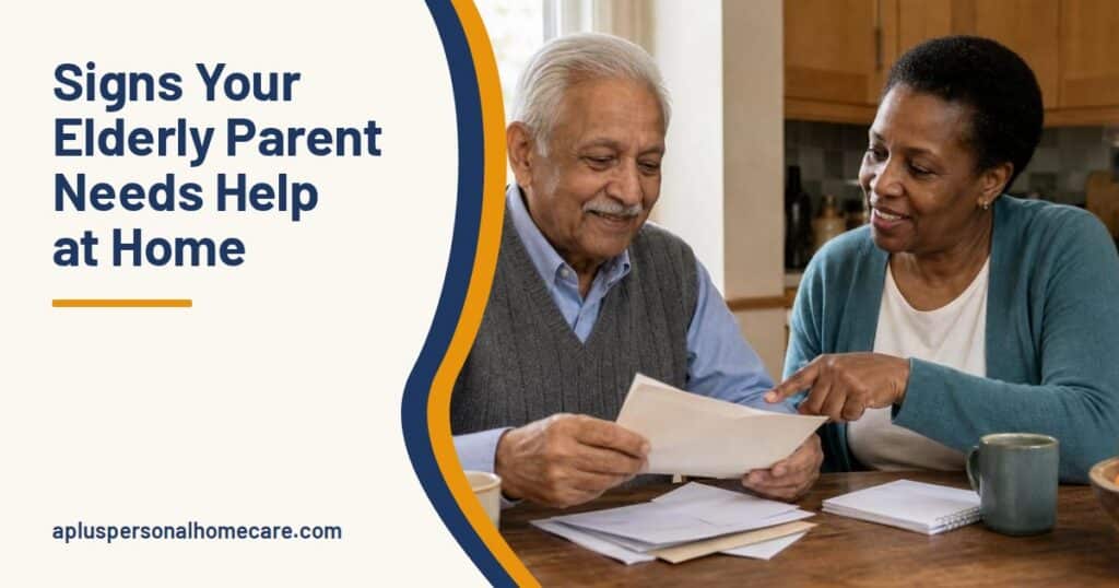 Older man in a gray knit vest reading a letter at a kitchen table while a caregiver in a teal cardigan points to it and smiles